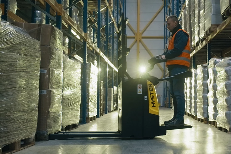Hyster electric pallet jack in warehouse
